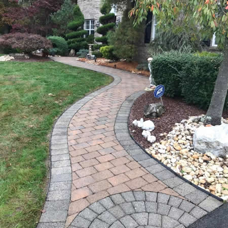 Concrete sidewalk cleaning removing algae and grime